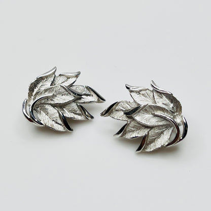 Vintage Crown Trifari silver leaf clip on earrings with textured leaves