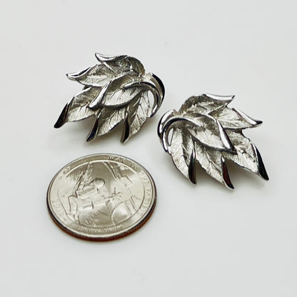 Vintage Crown Trifari silver leaf clip on earrings with textured leaves