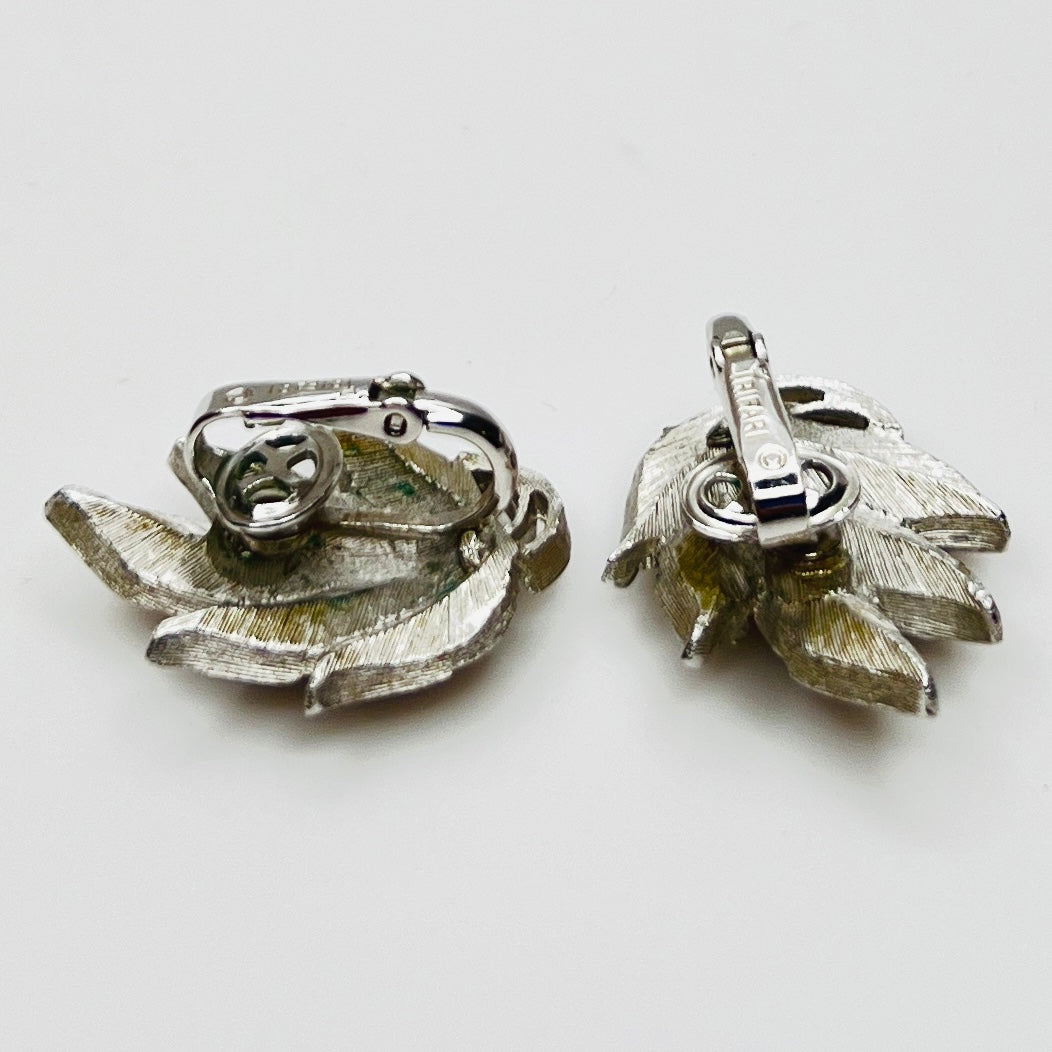 Side view Crown Trifari silver tone layered leaf clip earrings