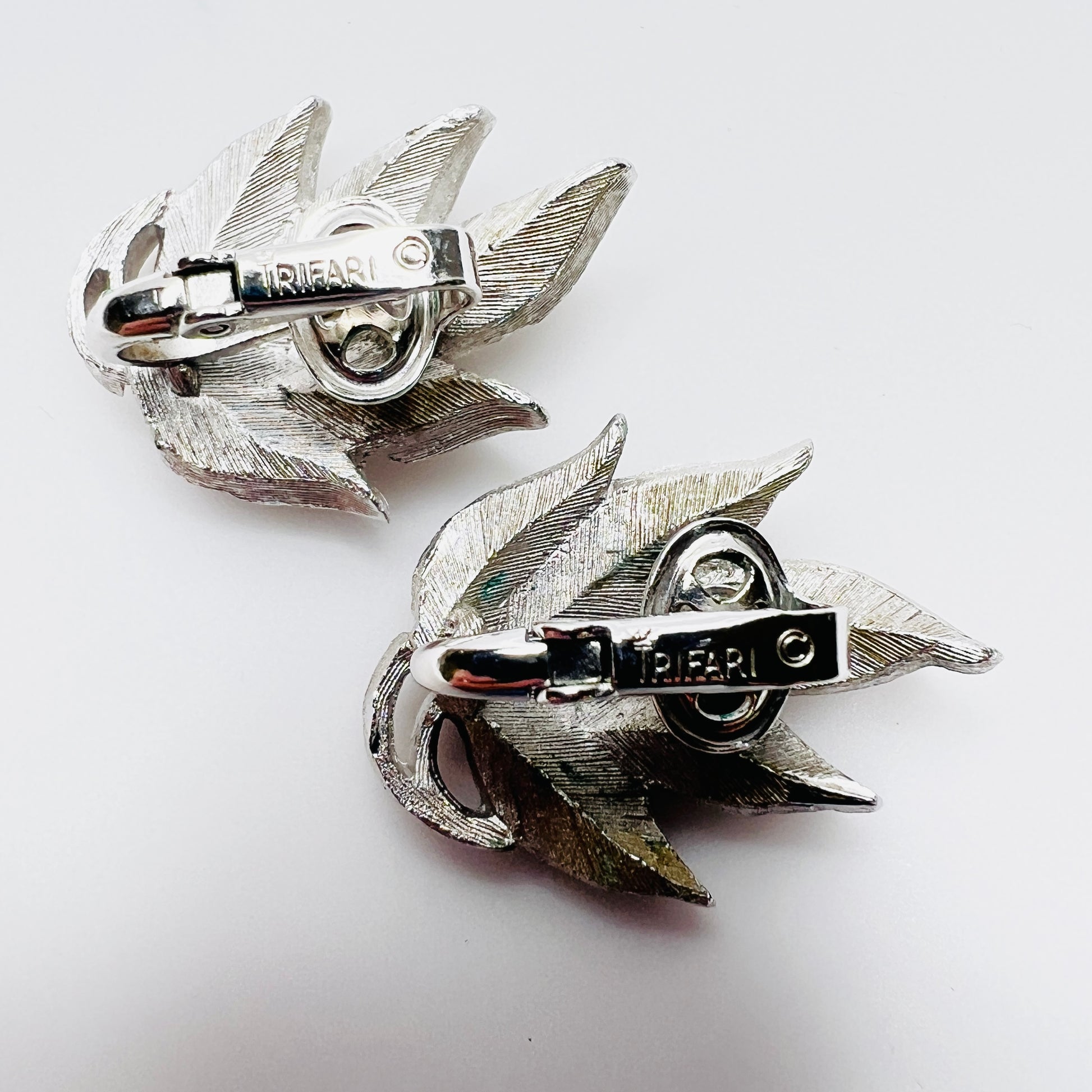 Back view signed Crown Trifari vintage clip on leaf earrings