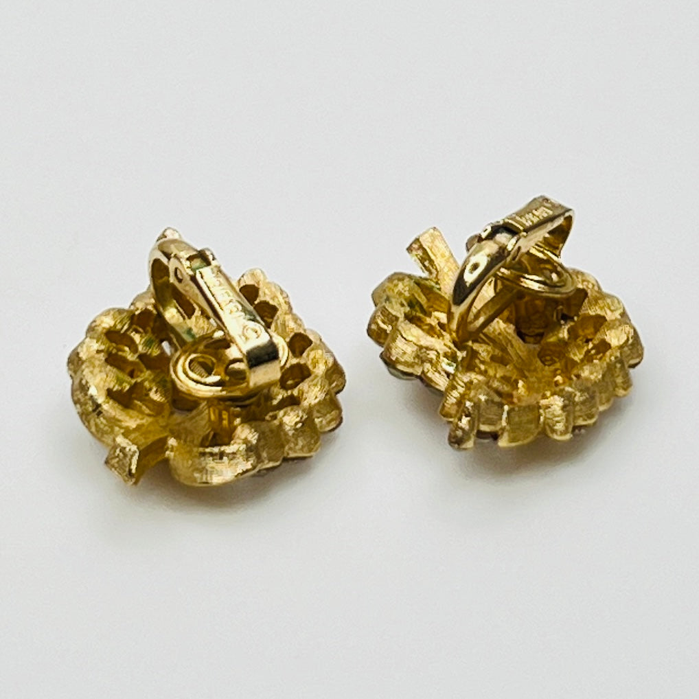Pair of Crown Trifari rhinestone clip-on earrings with gold-tone finish