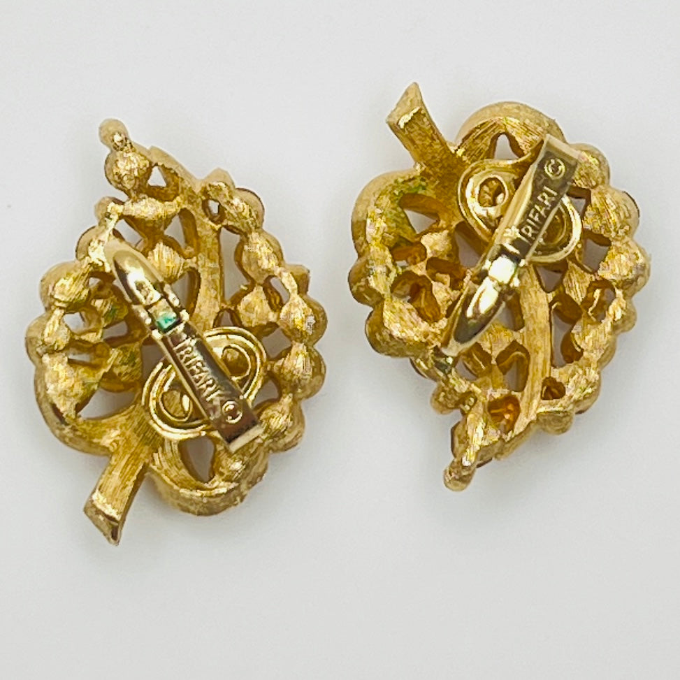 Pair of Crown Trifari rhinestone clip-on earrings with gold-tone finish
