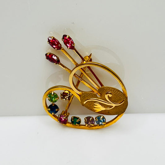 Vintage gold-tone painter’s palette brooch with multicolor rhinestones