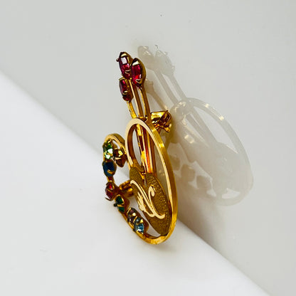 Vintage gold-tone painter’s palette brooch with multicolor rhinestones