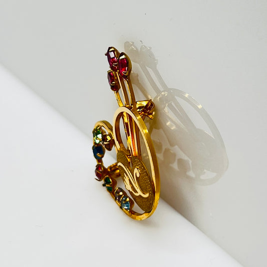 Vintage gold-tone painter’s palette brooch with multicolor rhinestones