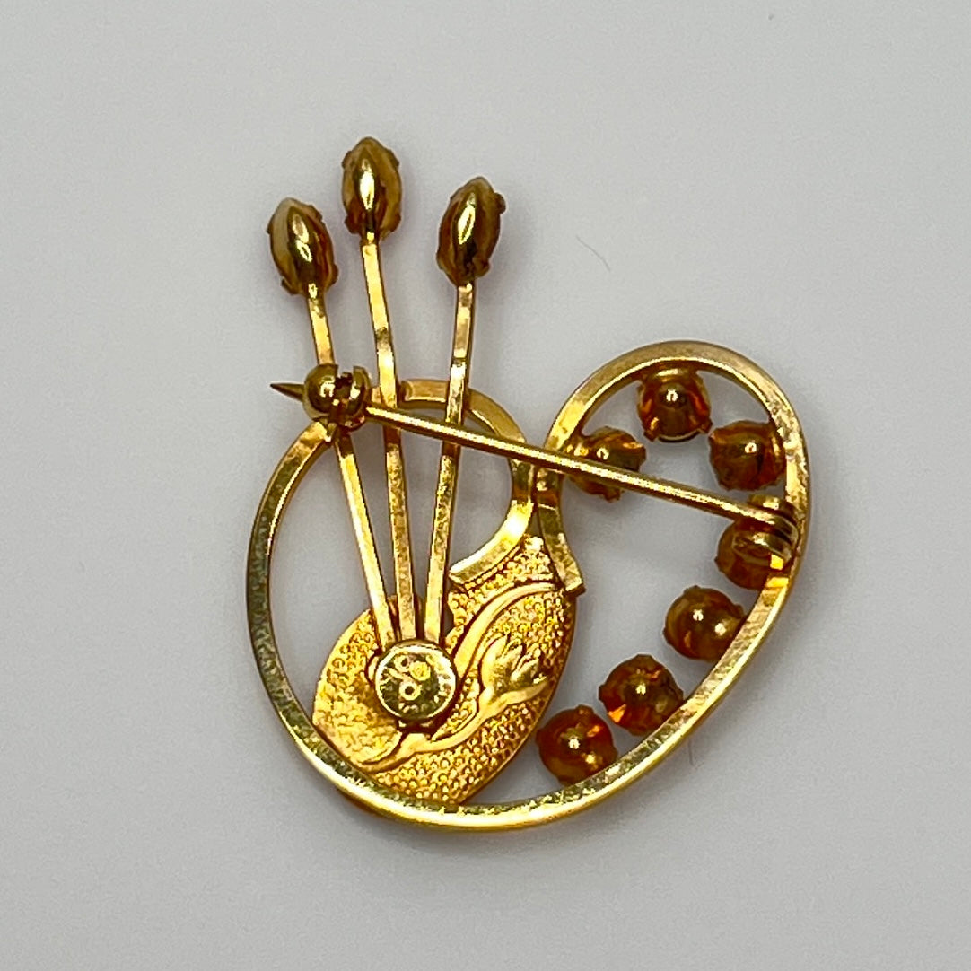 Reverse side showing DCE 14K gold-filled stamp and prong-set stones