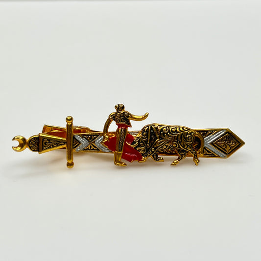 1990s Damascene matador and bull tie clip with gold and black enamel