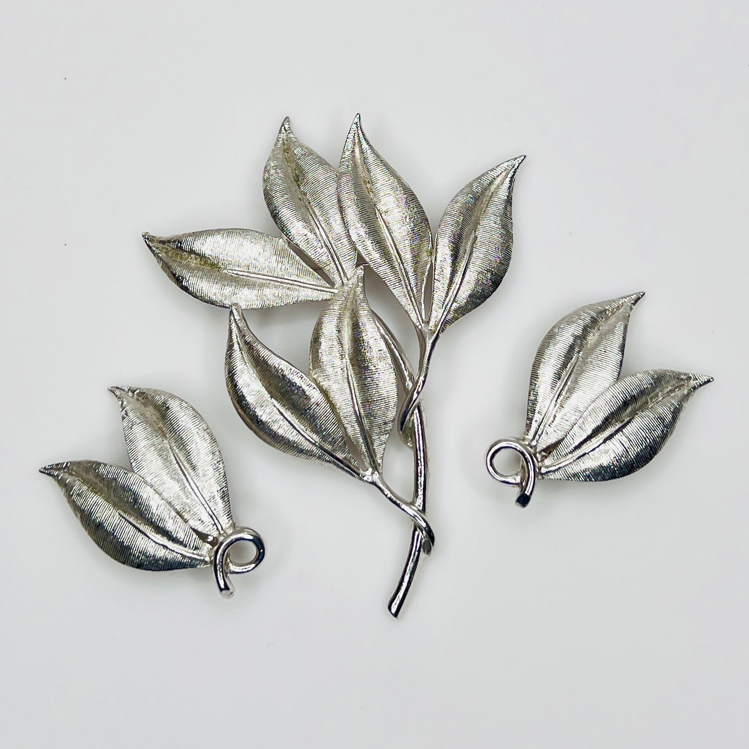 Mid-century signed Emmons leaf jewelry set in textured silver-tone