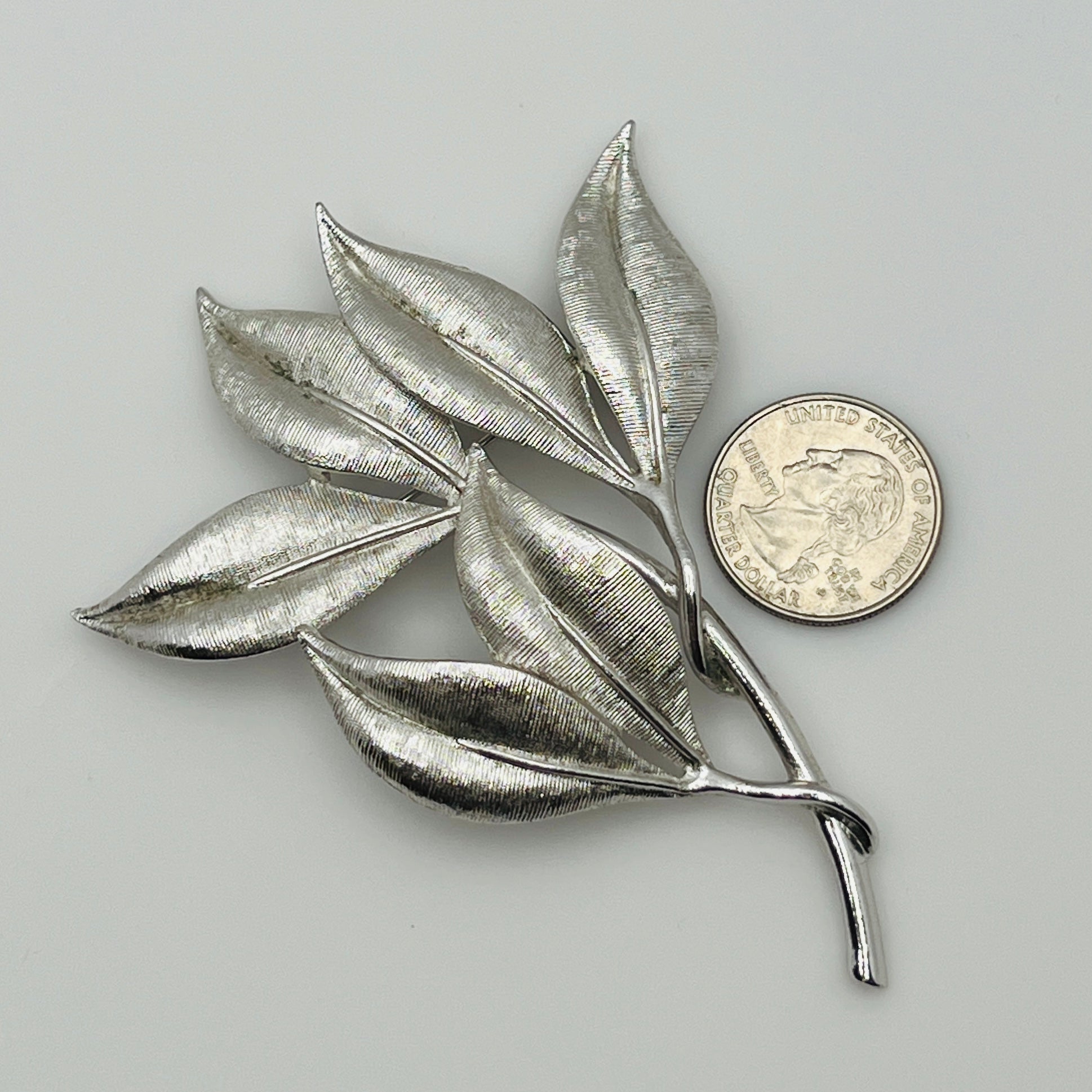 Mid-century signed Emmons leaf jewelry set in textured silver-tone