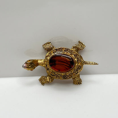 Vintage figural turtle brooch with glass tortoise shell top and filigree gold body