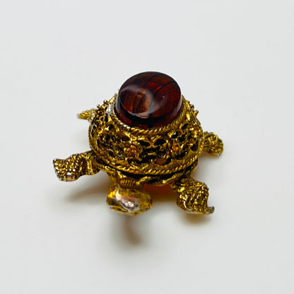 Vintage figural turtle brooch with glass tortoise shell top and filigree gold body
