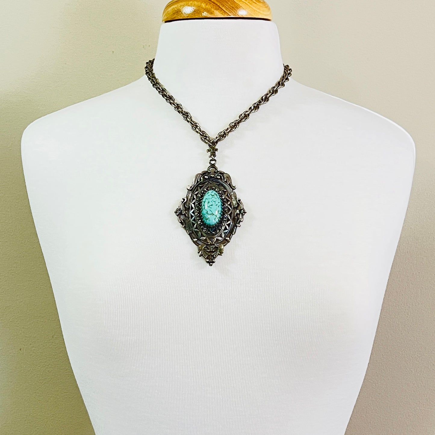 Ornate Victorian Revival pendant with oval faux turquoise cabochon