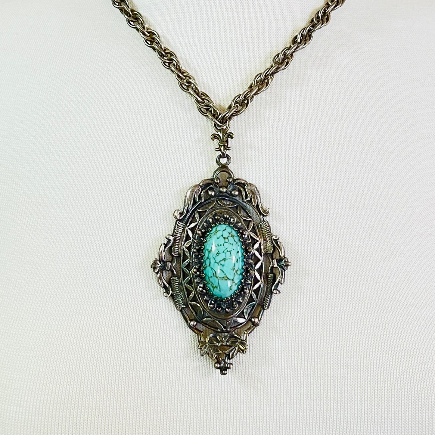 Ornate Victorian Revival pendant with oval faux turquoise cabochon
