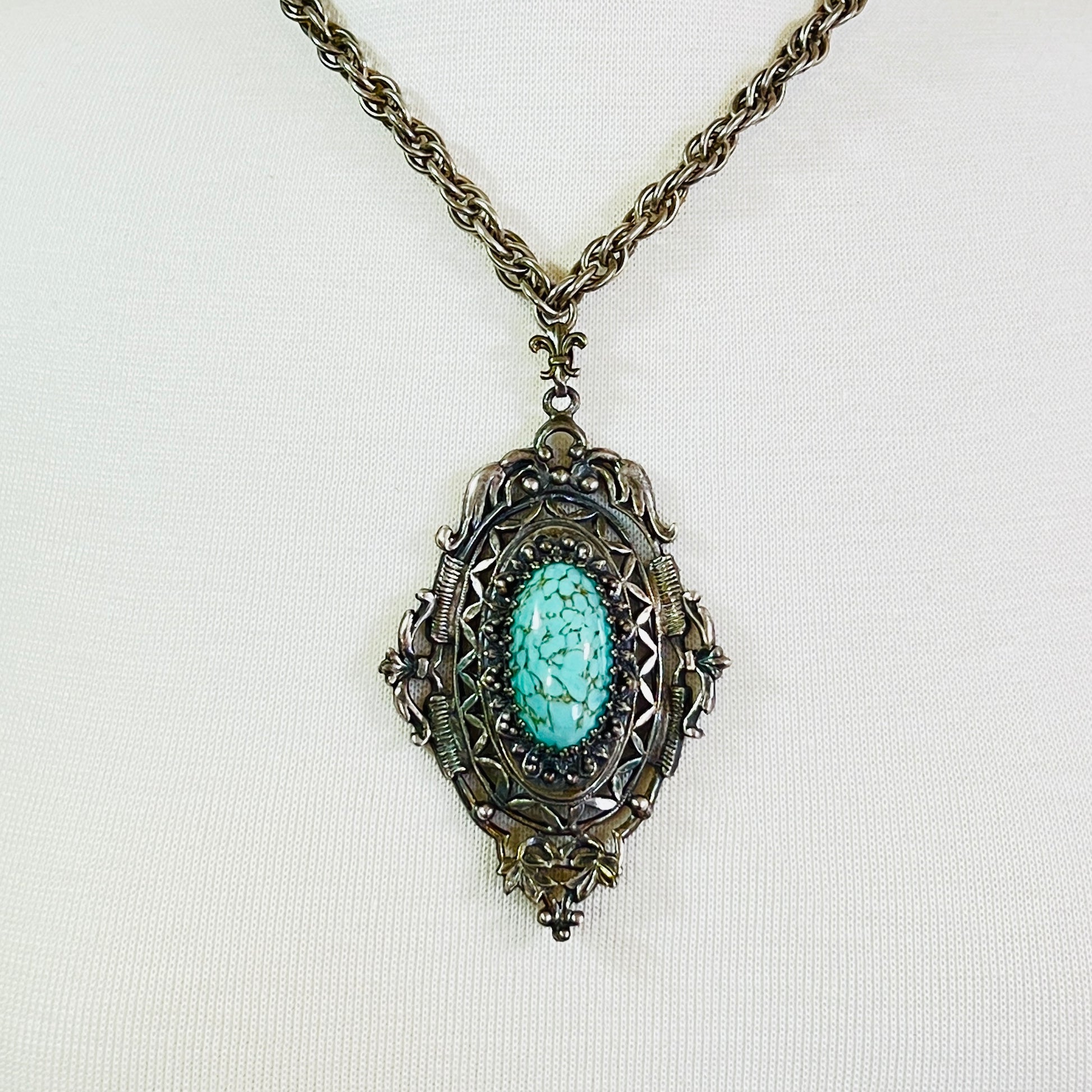 Ornate Victorian Revival pendant with oval faux turquoise cabochon