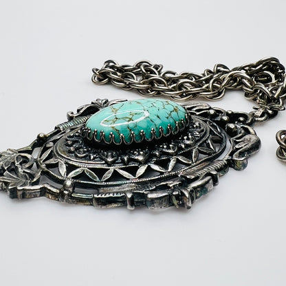 Ornate Victorian Revival pendant with oval faux turquoise cabochon
