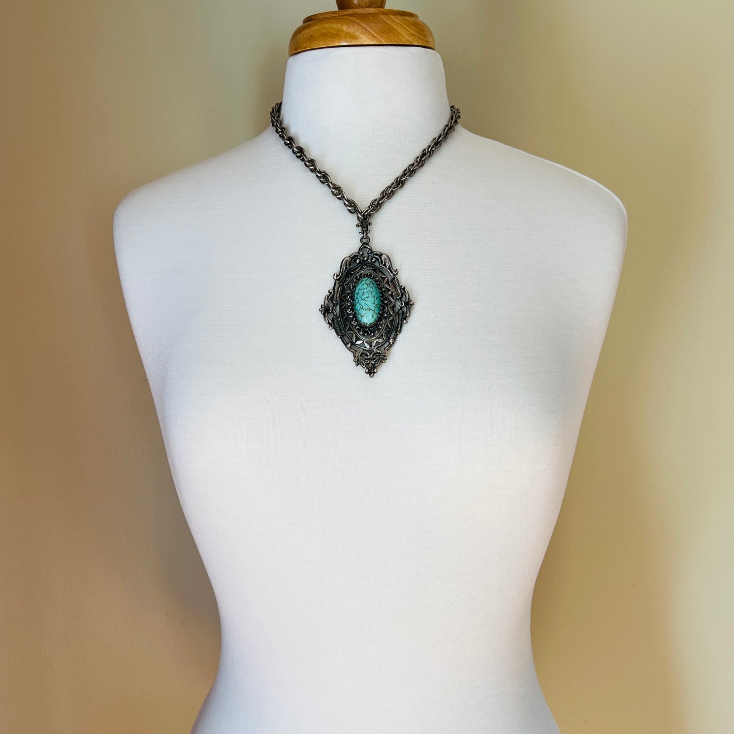 Ornate Victorian Revival pendant with oval faux turquoise cabochon