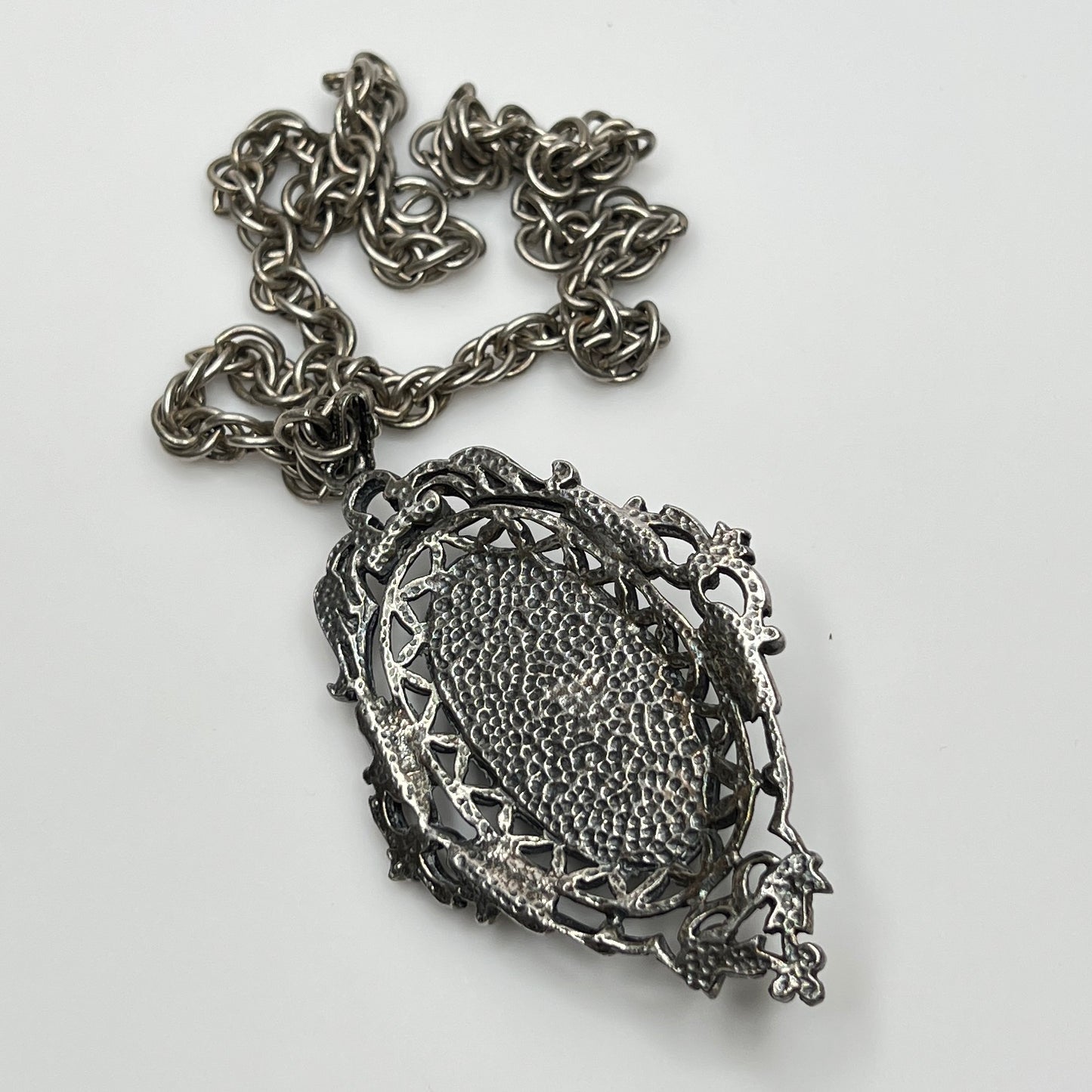 Ornate Victorian Revival pendant with oval faux turquoise cabochon