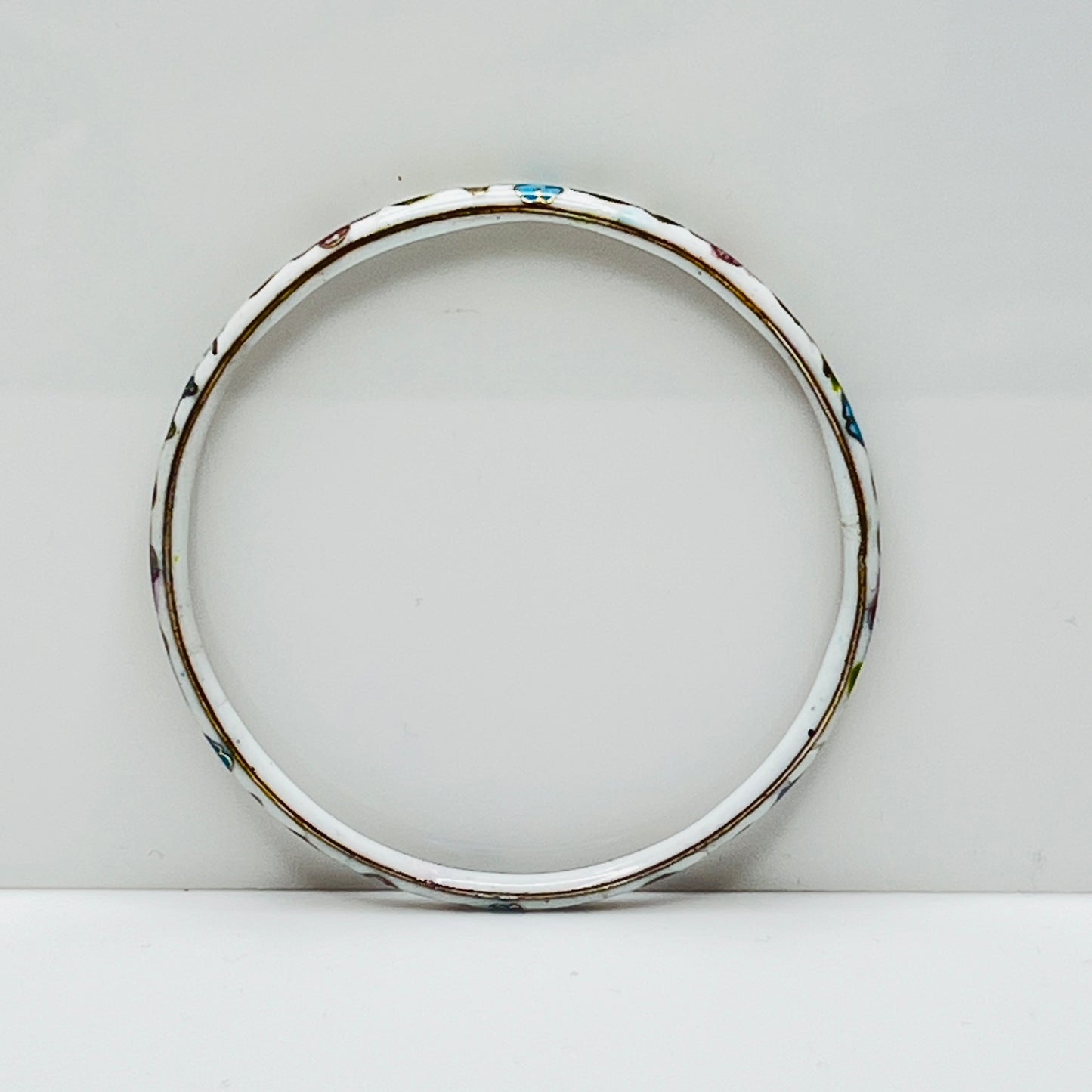 Vintage white cloisonné bangle bracelet with floral enamel design