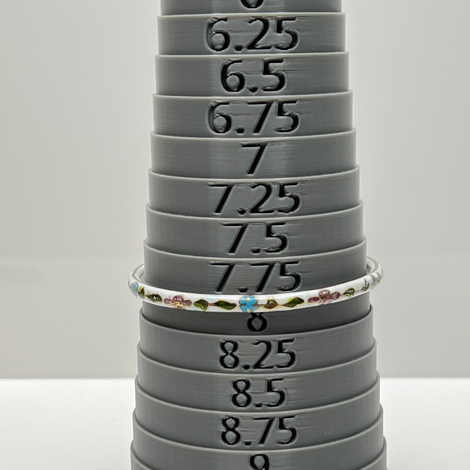 Vintage white cloisonné bangle bracelet with floral enamel design