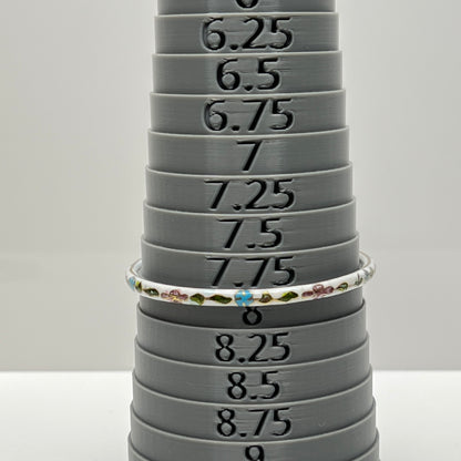 Vintage white cloisonné bangle bracelet with floral enamel design