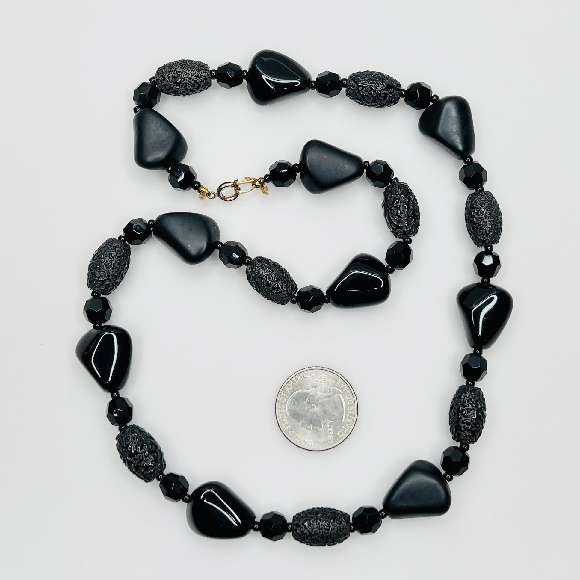 1980s black bead necklace coiled flat, 24 inches long