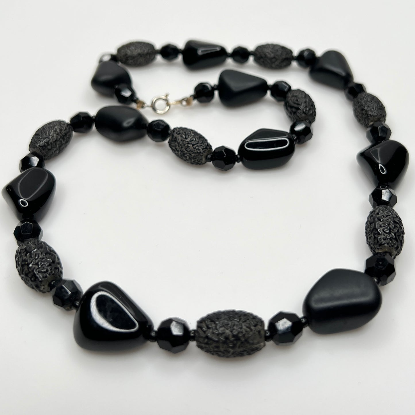 1980s black bead necklace coiled flat, 24 inches long