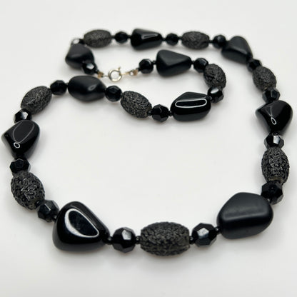 1980s black bead necklace coiled flat, 24 inches long