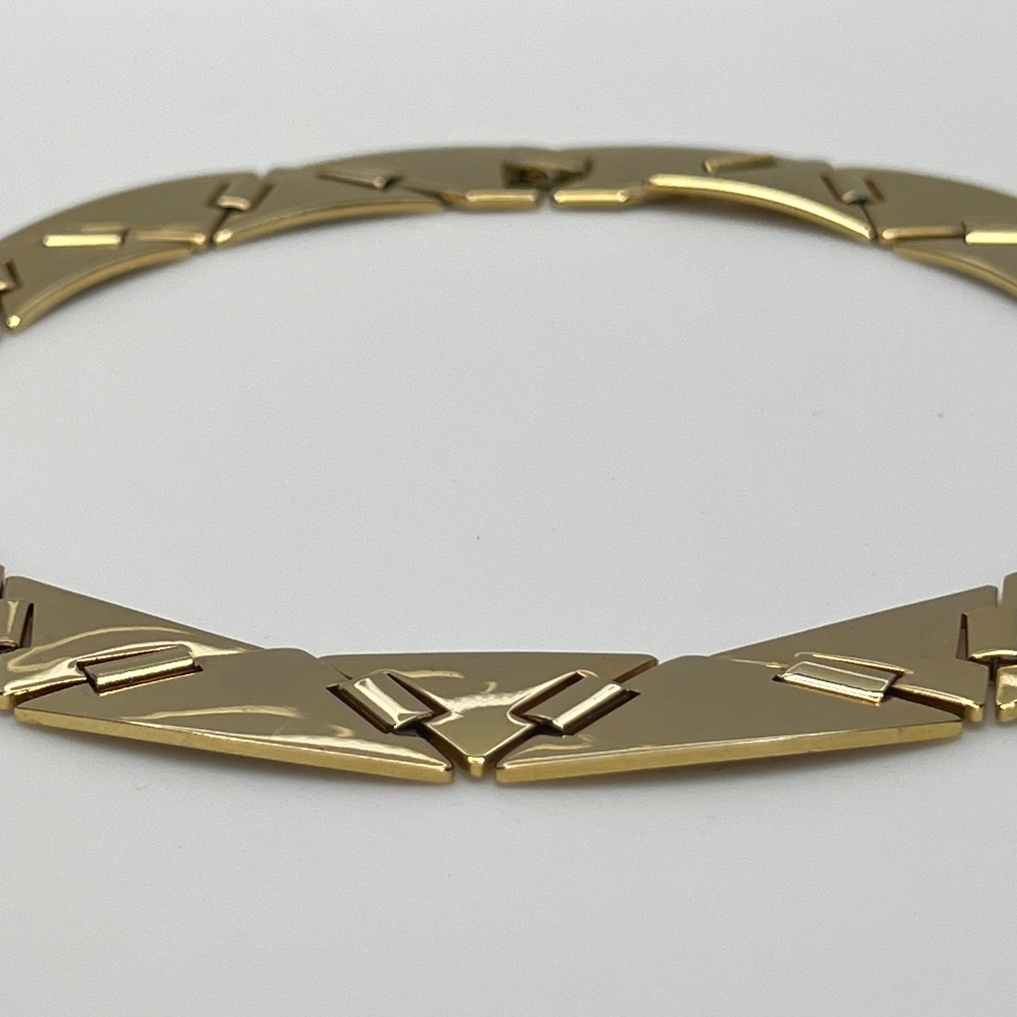 Vintage gold-tone choker necklace with geometric sculptural links