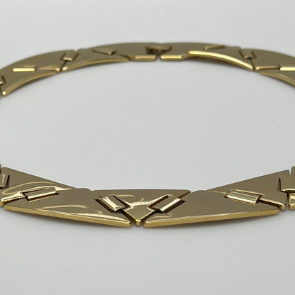 Vintage gold-tone choker necklace with geometric sculptural links