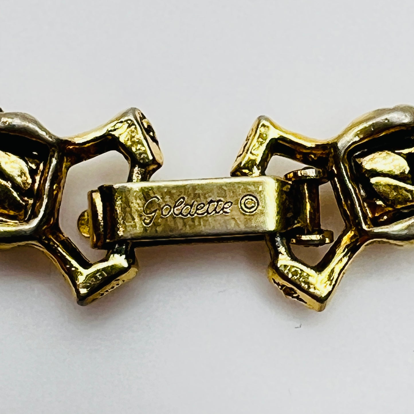 Close-up of Goldette signature on clasp