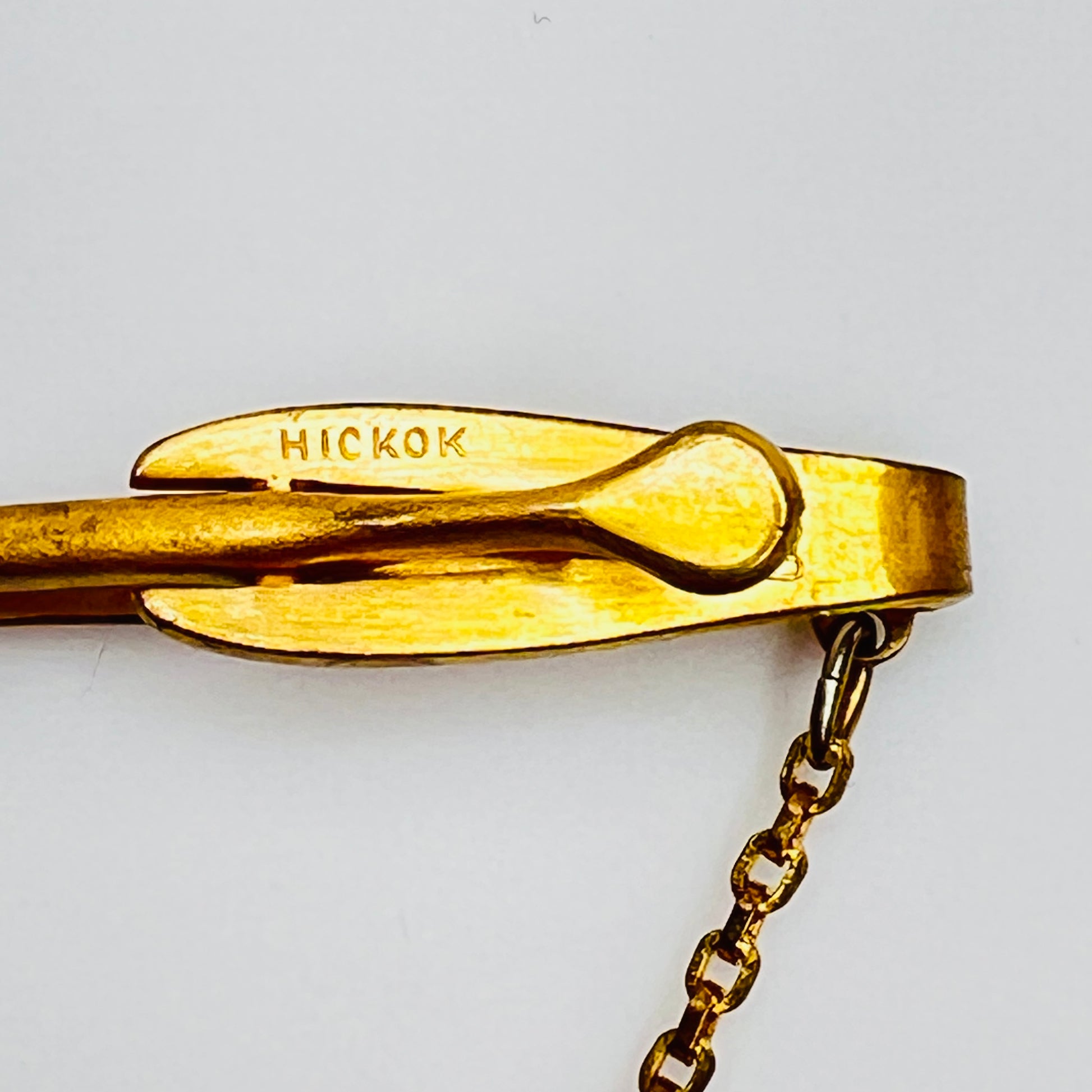 Hickok signature of midcentury monogram tie clip in gold-tone brass
