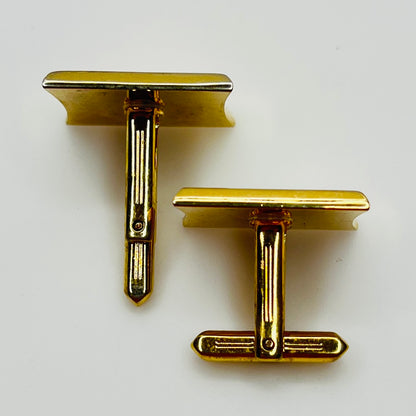 Rectangular gold cufflinks with black enamel and Gothic letter H