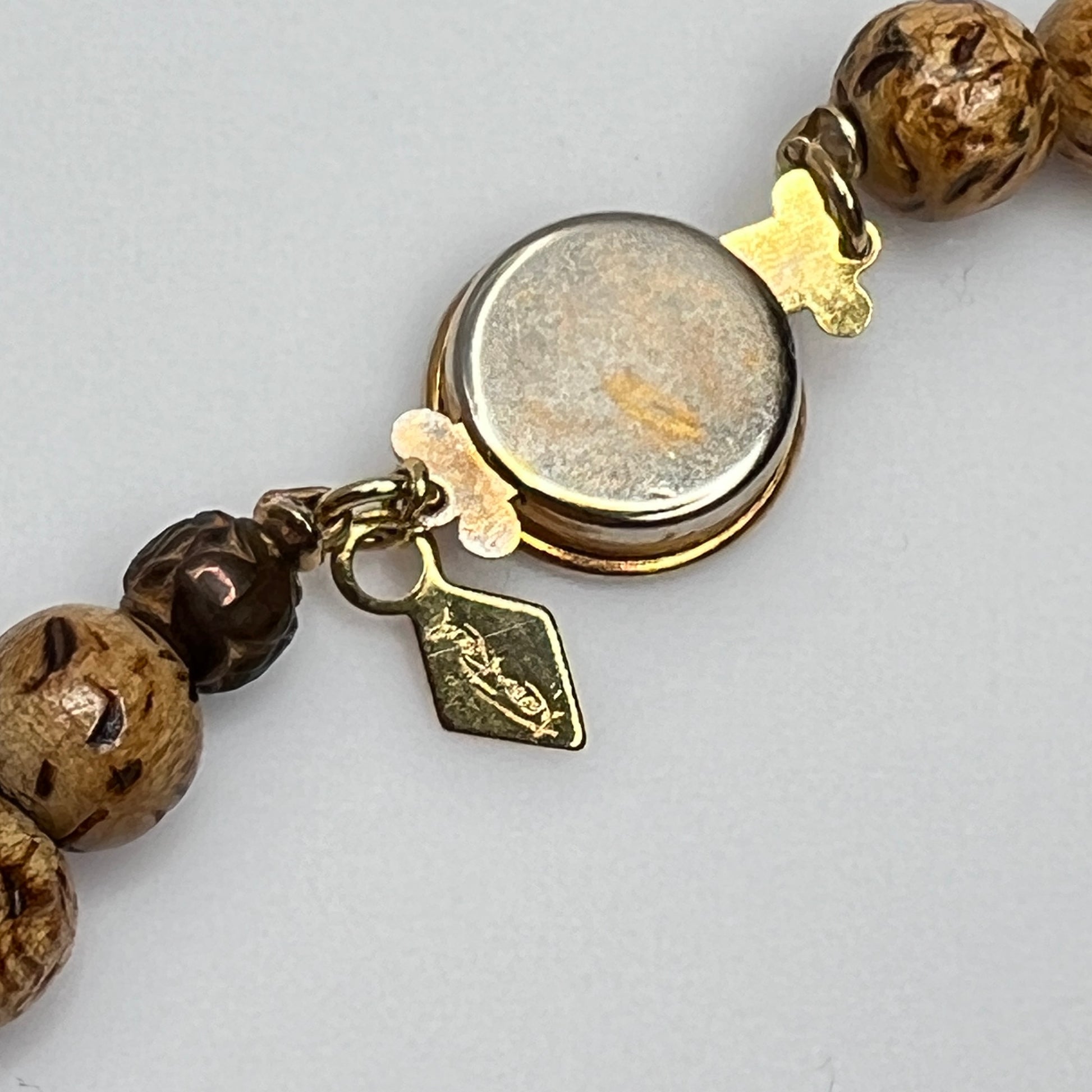 Vintage Karen Reed shell necklace with gold-tone Bergere clam and conch charms