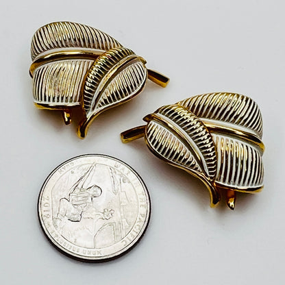 Vintage Kramer gold leaf clip on earrings with white enamel detail