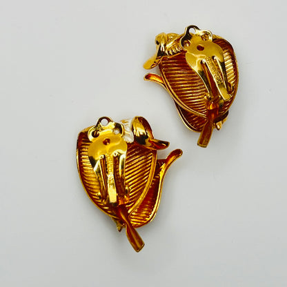 Back view signed Kramer clip on leaf earrings from the 1950s