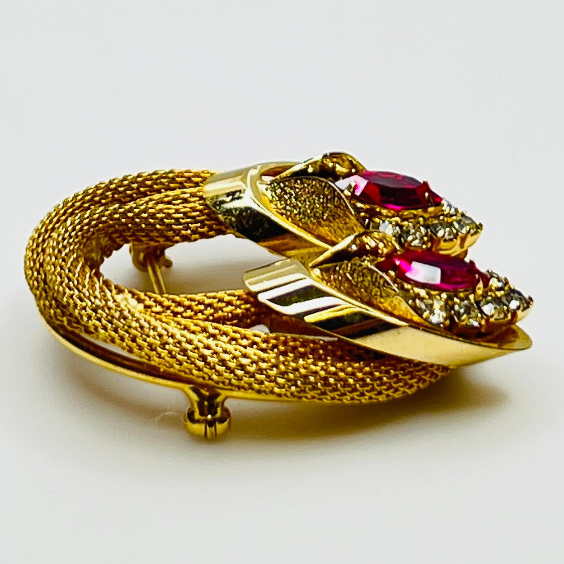 Side angle of vintage Kramer brooch showing dimensional design