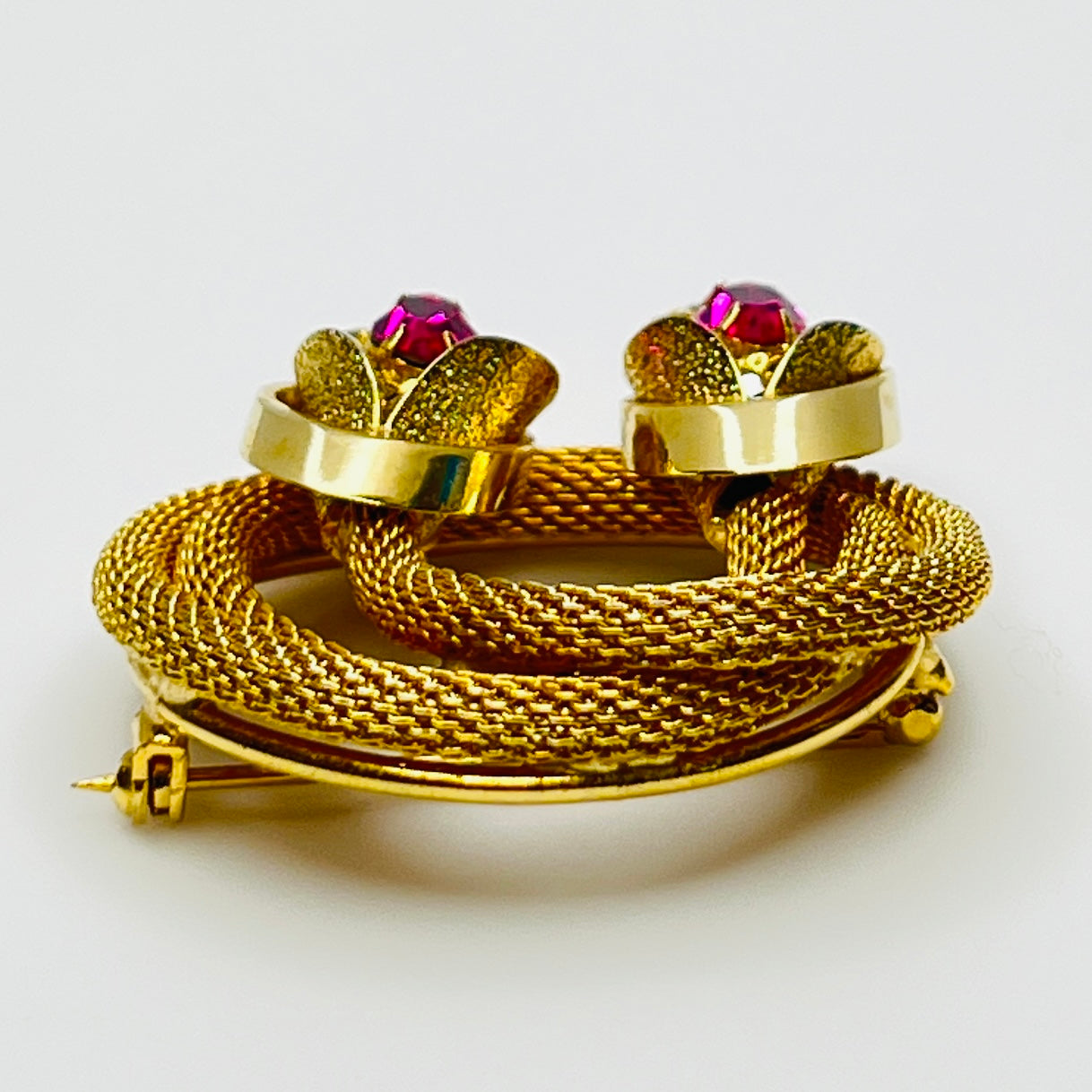 Side angle of vintage Kramer brooch showing dimensional design