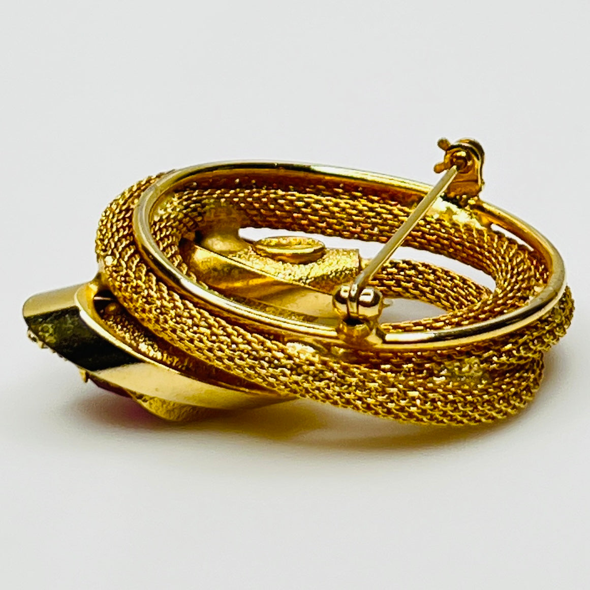 Side angle of vintage Kramer brooch showing dimensional design