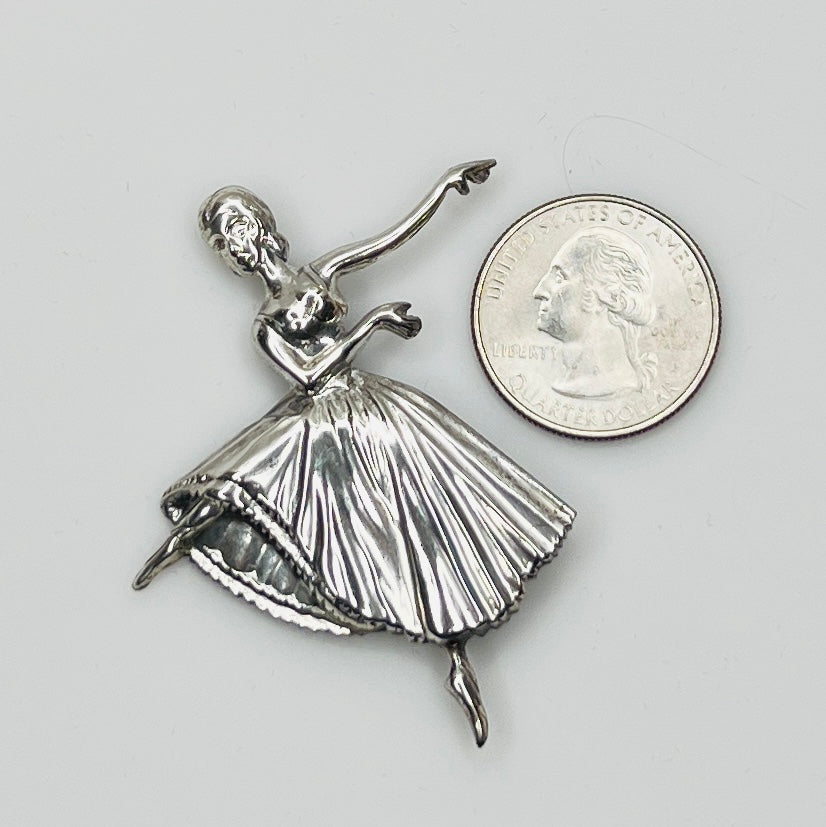 Sterling silver ballerina brooch with pleated skirt and outstretched arms