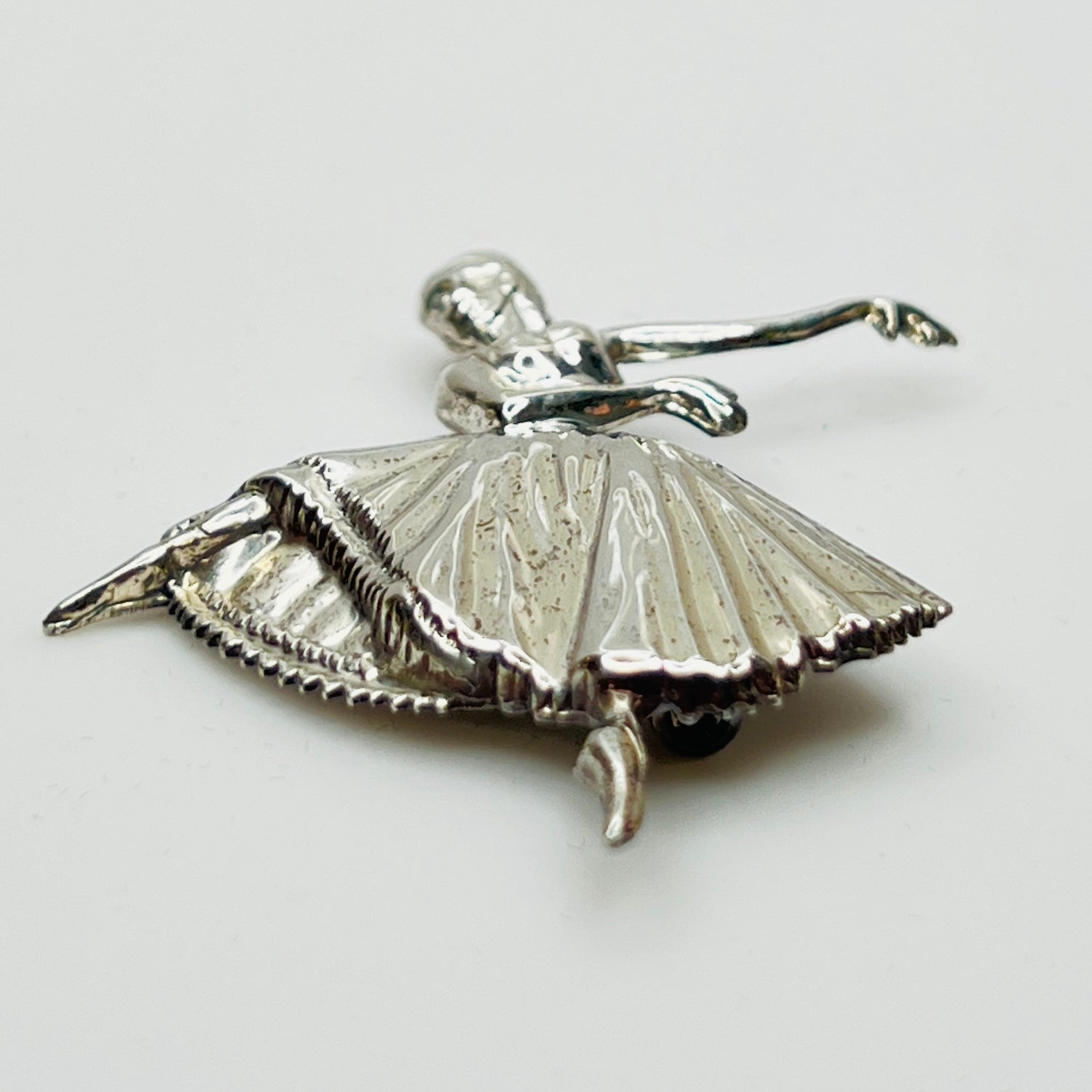 Sterling silver ballerina brooch with pleated skirt and outstretched arms