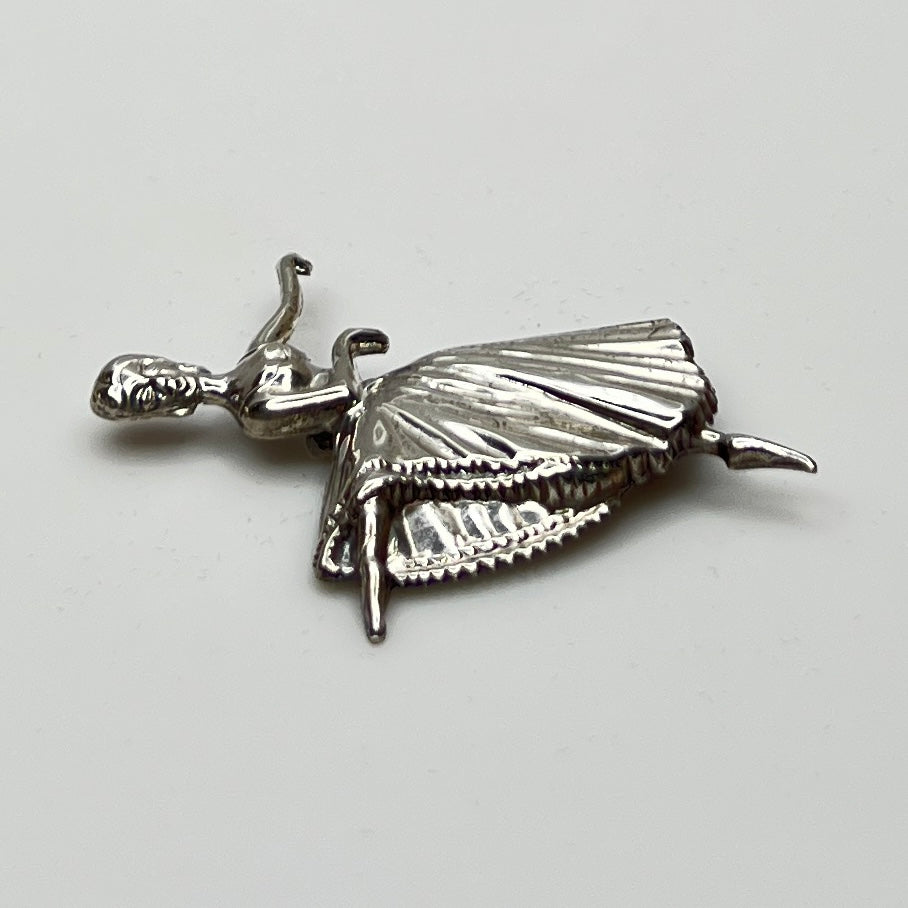 Sterling silver ballerina brooch with pleated skirt and outstretched arms