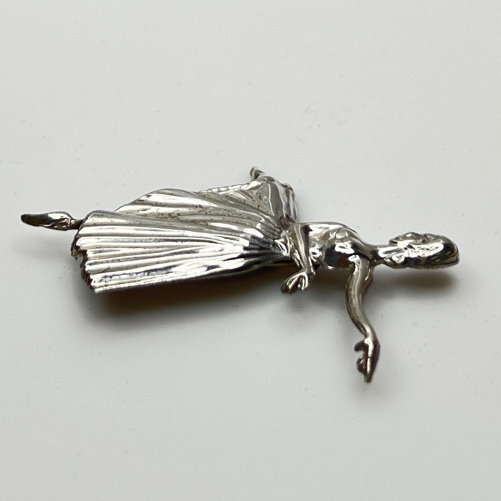 Sterling silver ballerina brooch with pleated skirt and outstretched arms