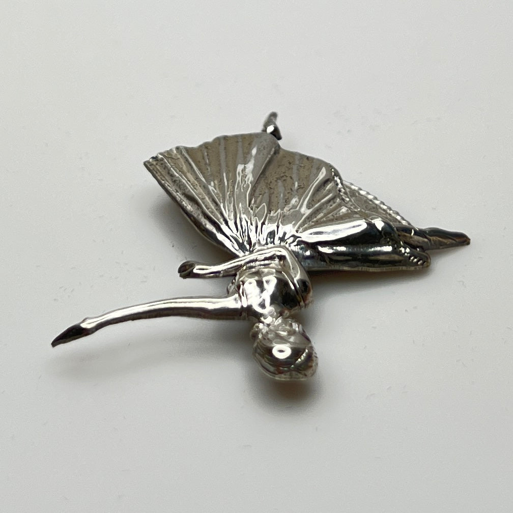 Sterling silver ballerina brooch with pleated skirt and outstretched arms