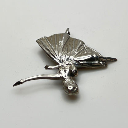 Sterling silver ballerina brooch with pleated skirt and outstretched arms