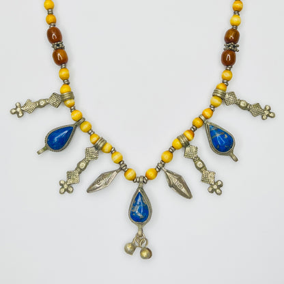 Vintage tribal necklace with lapis lazuli teardrop charms and yellow beads