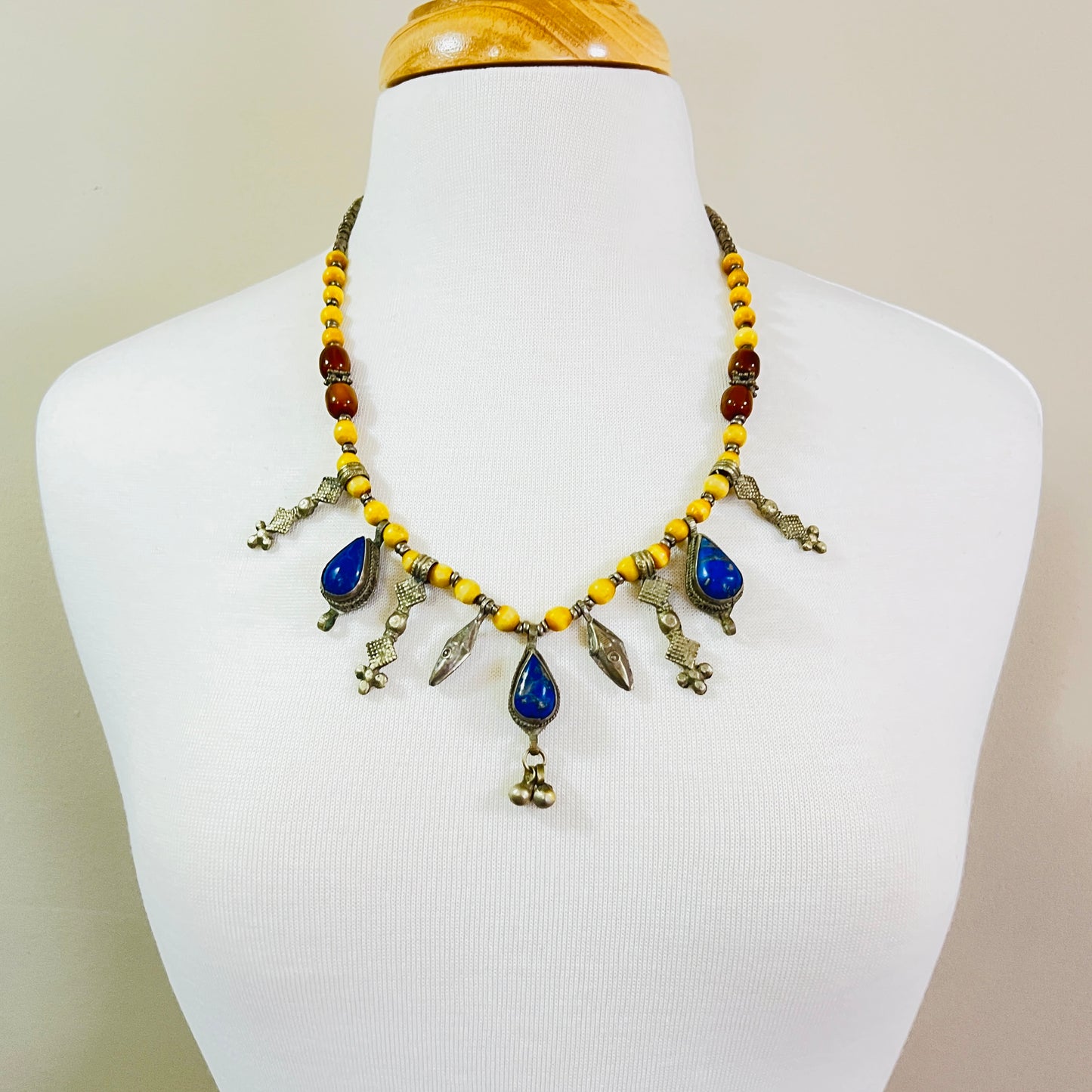 Vintage tribal necklace with lapis lazuli teardrop charms and yellow beads