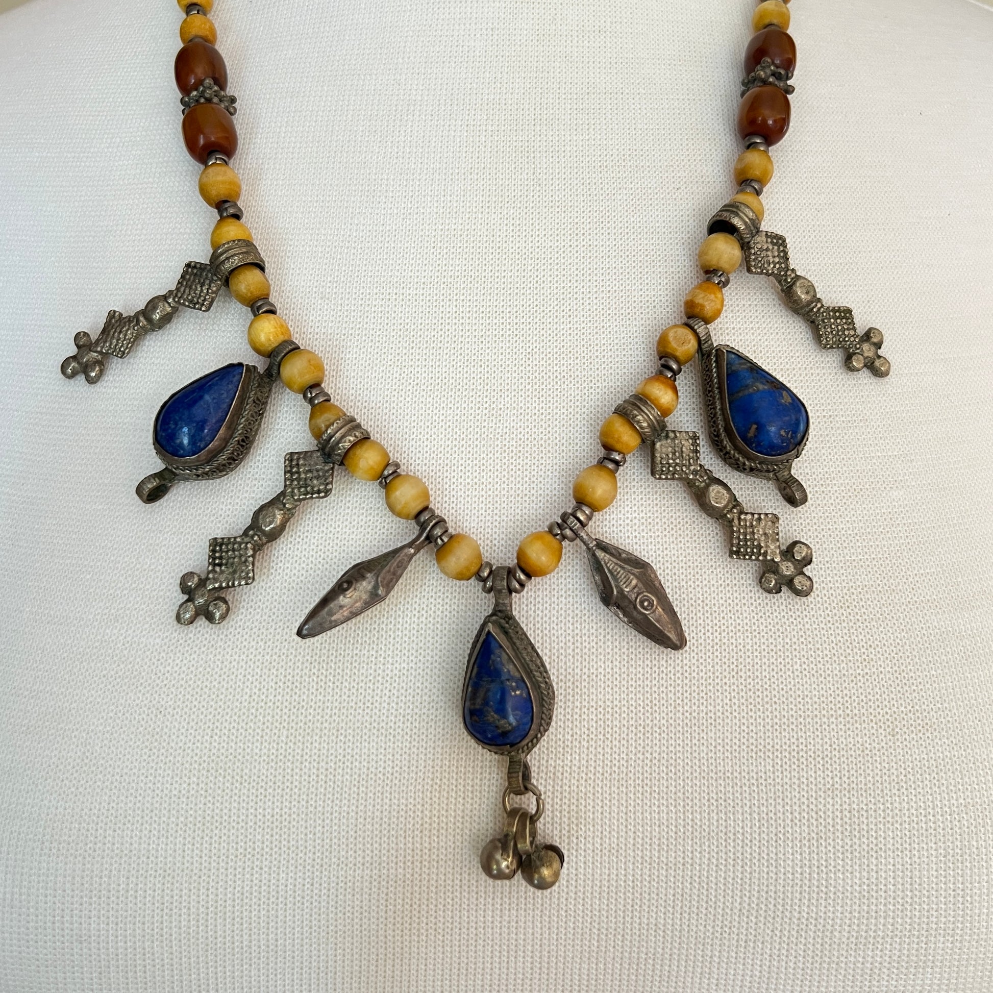Vintage tribal necklace with lapis lazuli teardrop charms and yellow beads