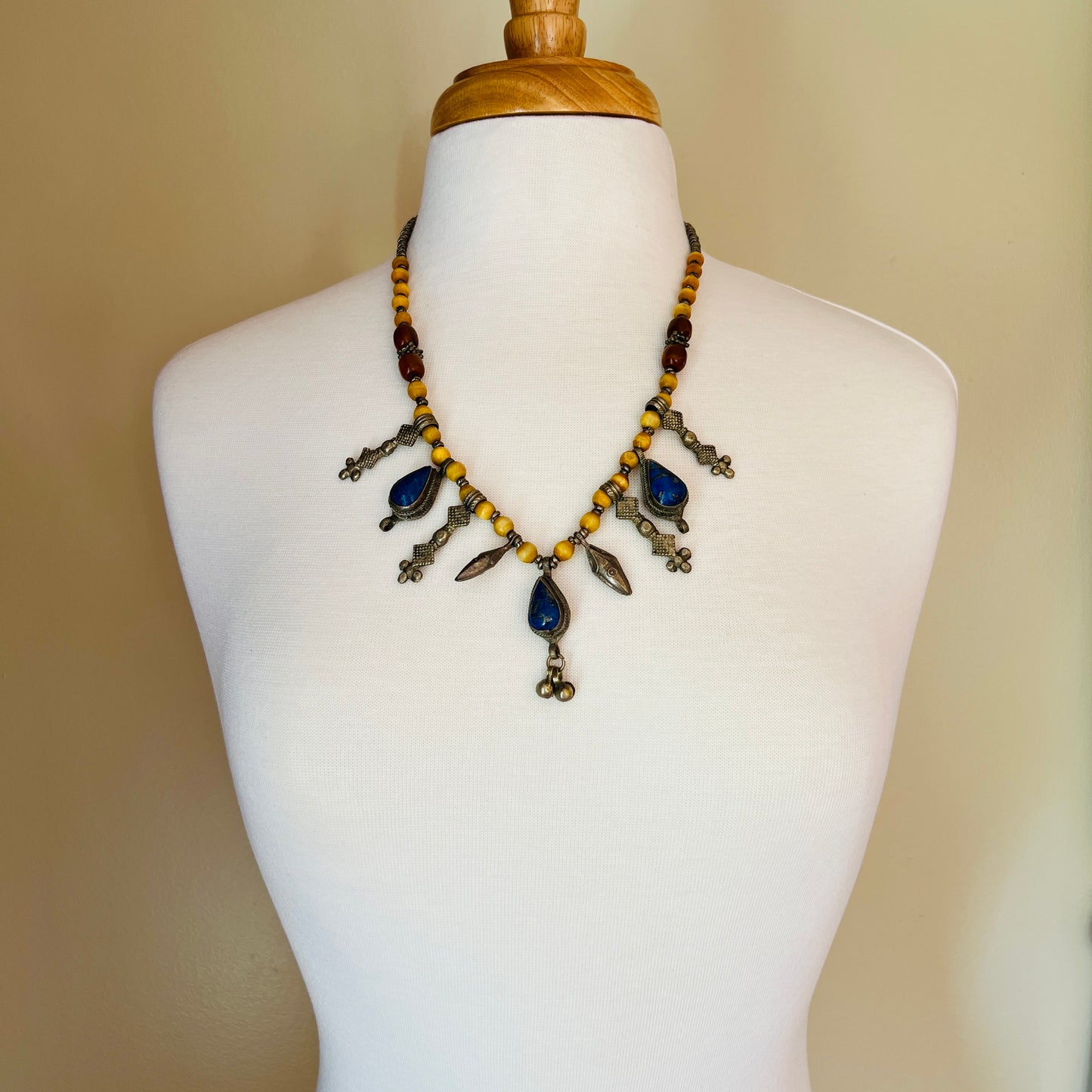 Vintage tribal necklace with lapis lazuli teardrop charms and yellow beads