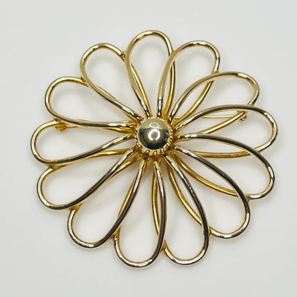 Extra large gold-tone daisy brooch with openwork petals