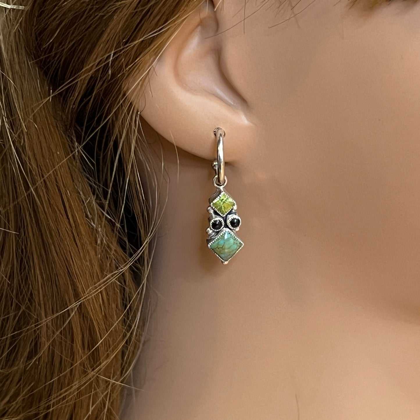 Sterling silver Leo Feeney earrings with peridot, turquoise, and black onyx dangle